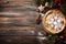 christmas pie golden crust and xmas decoration on wooden table,ai generated