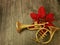 Christmas poinsetta red flower, gold trumpet, french horn