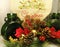 Christmas poinsettias, pine cones, evergreen, green vases,