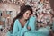 Christmas Portrait of Beautiful brunette girl wears in turquoise