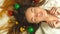 Christmas portrait of cheerful young girls with decorating toys