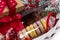 Christmas present in basket with pastry, wine, decor