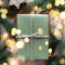 Christmas present box wrapped in green kraft paper and decorated with pine tree branch on festive New Year background