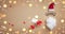 Christmas present or gift and funny face of Santa Claus on golden celebration background