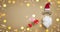 Christmas present or gift for Secret Santa with Santa hat, glasses and beard on golden celebration background