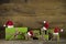 Christmas presents in apple green decorated with red santa hats