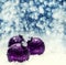 Christmas purple balls snow and space abstract background. Festive christmas abstract background with bokeh defocused lights.