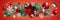 Christmas red background, festive horizontal border. Poinsettia flower. Mixed ornaments, green gold glass balls, stars, snowflakes