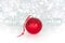 Christmas red ball on red ribbon on background of shiny tinsel, white bolls, lights and sparkles bokeh close up