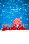 Christmas red balls and candy in snow on blue