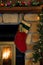 Christmas Red Corduroy Stocking Hanging on Fireplace