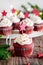 Christmas red velvet cupcakes with a star shaped cake pick
