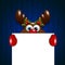 Christmas reindeer holding blank over blue background