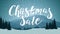 Christmas sale, discount banner with large lettering and winter landscape with mountains on the horizon, pine forest.