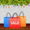 Christmas sale. Shoping paper bag on wood table top