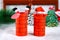 Christmas Santa Claus in chimney made from toilet paper hub, colored paper, marker, glue, fishing line and cotton pad. DIY toy on