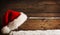 Christmas Santa Claus Hat Hanging On Wood Plank, Xmas Concept