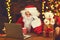 Christmas. Santa Claus with laptop reading letter