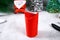 Christmas Santa Claus made from toilet paper hub, colored paper, marker, glue, fishing line and cotton pad. DIY toy on the