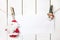 Christmas Santa Claus and snowman clothespin holding white paper