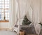 Christmas scandinavian bedroom with white canopy