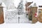 Christmas scene house gates in snow