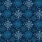 Christmas seamless pattern with snowflakes. Blue wrapping paper. Textile design, interior decor and New Year pattern