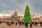 Christmas season in Kaunas, town hall square with cathedral, Lithuania illuminated Christmas tree