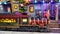 Christmas season miniature street scene with a train