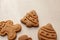 christmas shaped cookies on white wooden background
