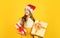 Christmas shopping online. time for discount. smiling kid hold purchase. presents and gifts from santa claus. small girl