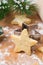 Christmas shortbread cookies in the shape of stars on board