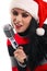Christmas Singer with microphone