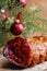 Christmas smoked ham under fir branch