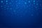 Christmas snow. Falling snowflakes on deep blue background.