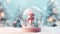 Christmas snow globe with cute snowman. Magical snow globe with Christmas decorations. A wintry scene.