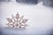 Christmas snowflake on fake snow isolated on