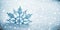 Christmas snowflake on fake snow isolated on