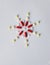 Christmas snowflake flower from Pharmacology assorted medicine pills, tablets and capsules. Different colors tablet on