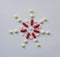 Christmas snowflake flower from Pharmacology assorted medicine pills, tablets and capsules. Different colors tablet on