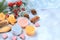 Christmas spa and wellness composition with creams, fir branches, cinnamon, aromatherapy and winter skin care, lifestyle concept,