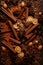 Christmas spices, fruit pieces, baubles, seeds and leaves abstract background.