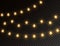 Christmas star lights isolated on dark transparent background. Glowing golden garland lights. Led neon lamp. Bright