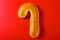 Christmas stick shape bread on a red background
