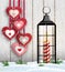 Christmas still-life with hearts and black lantern