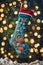 Christmas stocking underwater with fishs and sea plants around, xmas background