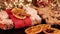 Christmas Stollen in baker`s female hands close up. Traditional christmas german dessert. Cake with nuts, raisins with marzipan a