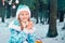 Christmas story. happy little girl smiling near christmas tree with toys