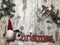Christmas stuff: symbol, pine tree, newyear tree, santa, cone, candle, silver snowflakes on wood background