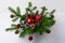 Christmas table centerpiece with red balls and rustic ornaments